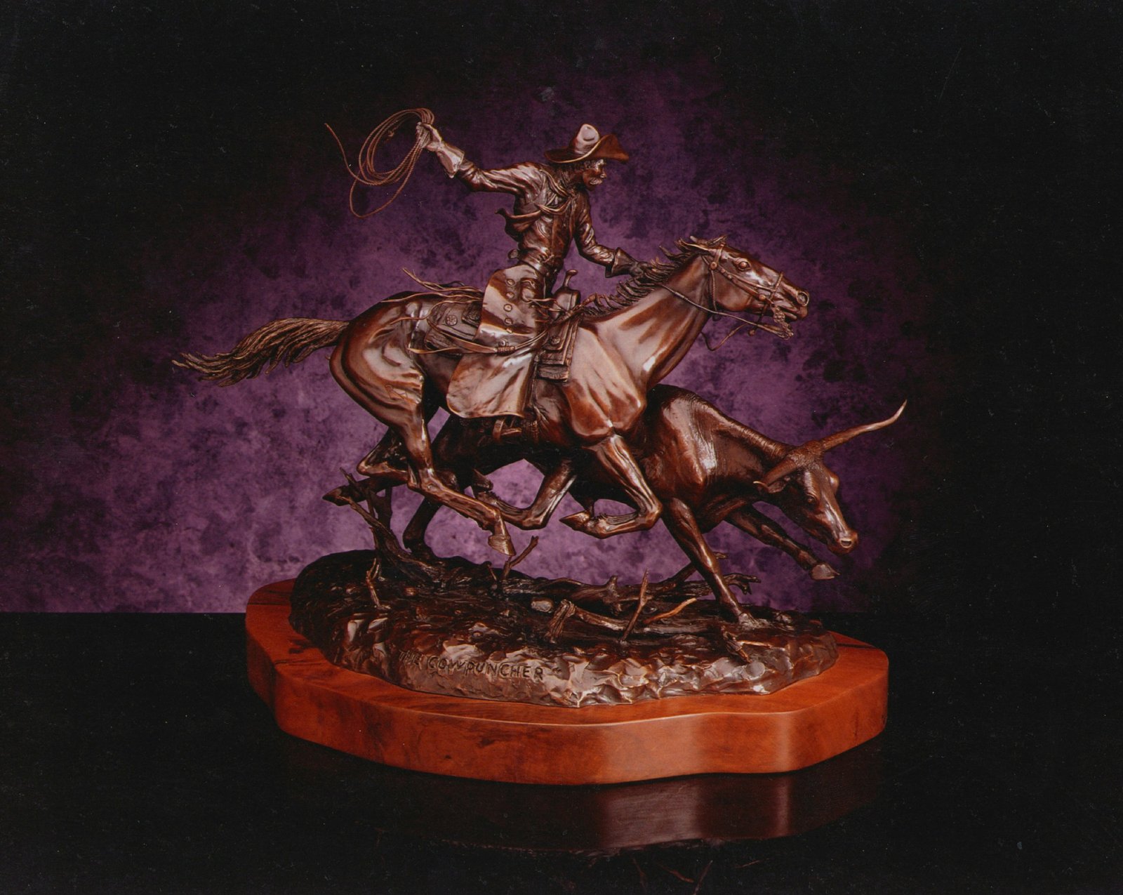 The Cowpuncher bronze sculpture